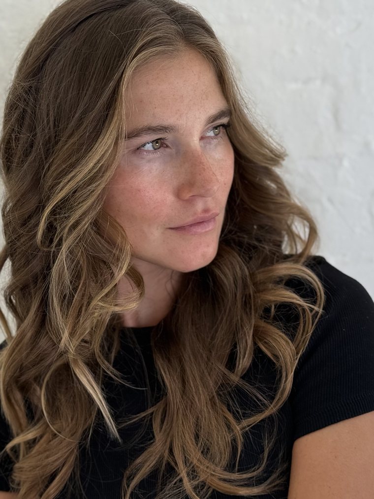 Lived-in balayage finished with soft waves