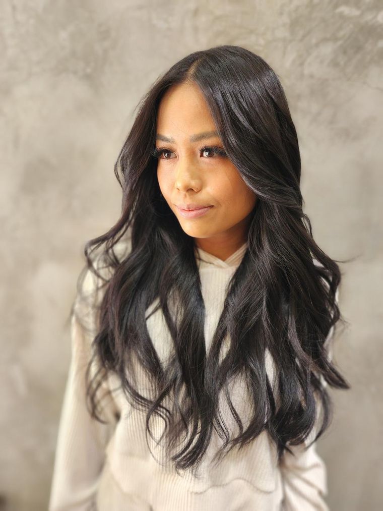 Bridal hair styled in soft brunette waves for a New York wedding